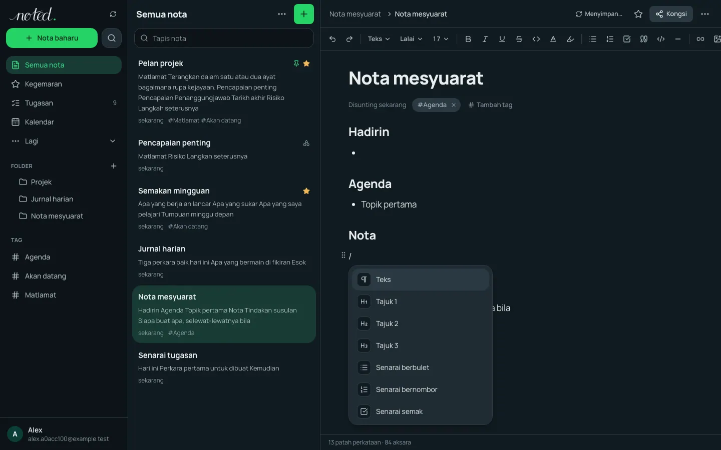 Menu garis miring dalam editor yang menyenaraikan blok untuk disisipkan